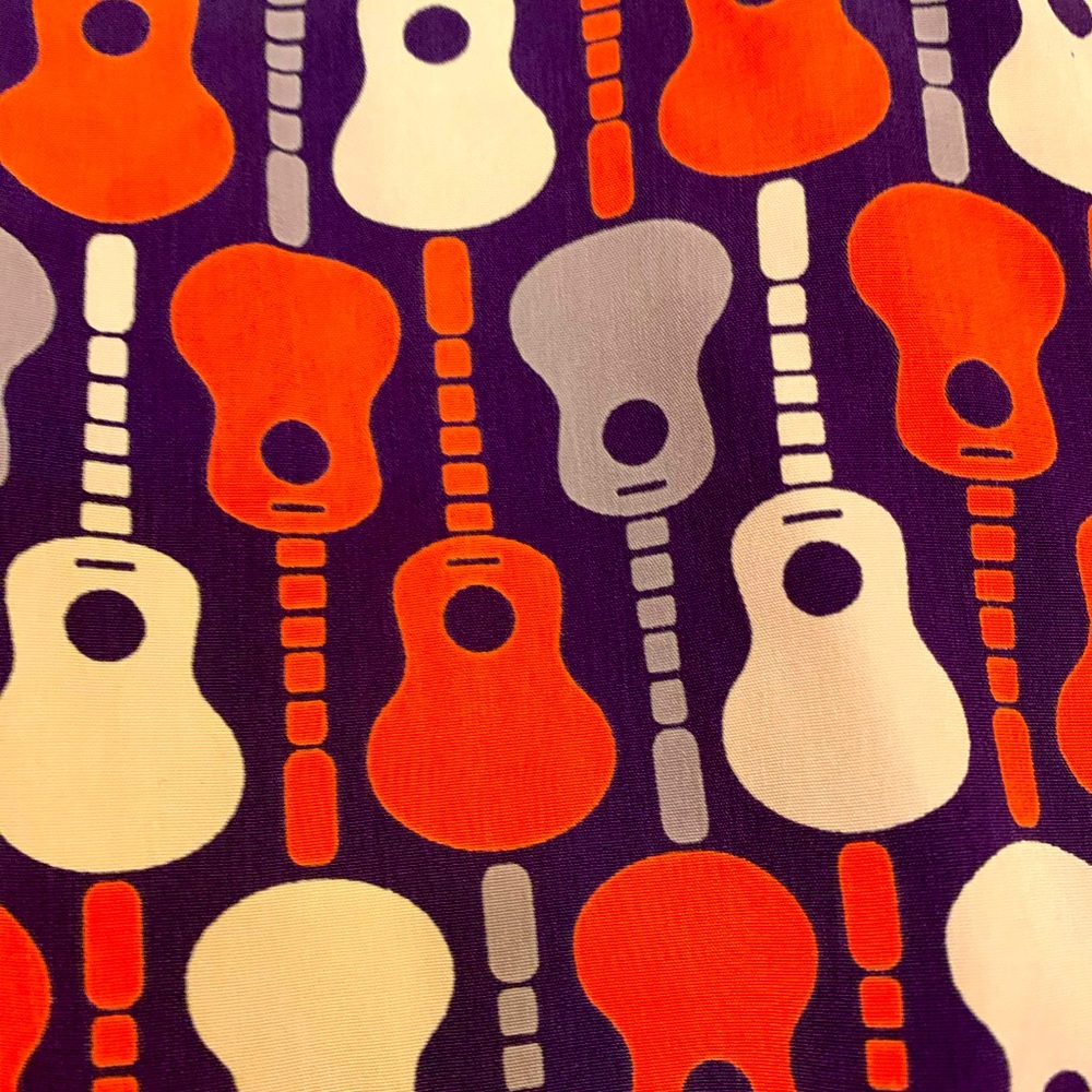 Eye catching guitar dress. Never worn. Fun colors!